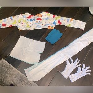 Toddler eczema clothing and sleep. Edenswear dinosaur top with scratch mittens